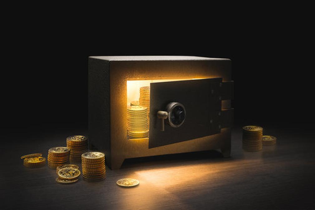 Image of Goldco - Steel bank safe on a dark background